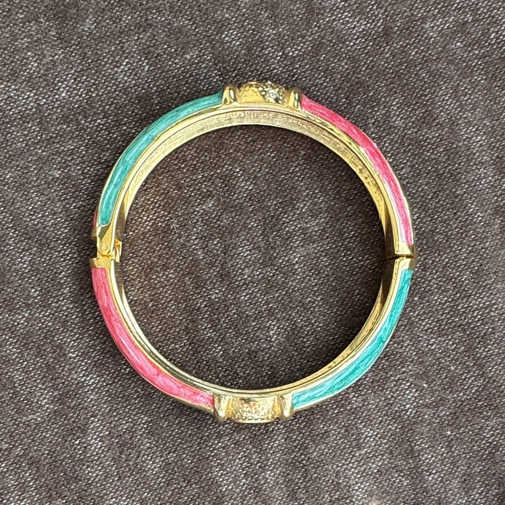 Elegant Gold Bangle with Pink and Green Accents